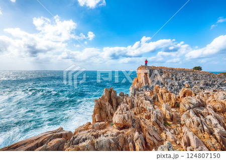 Unbelivable view of cliffs in valley Cala Domestica  and storm on the sea 124807150