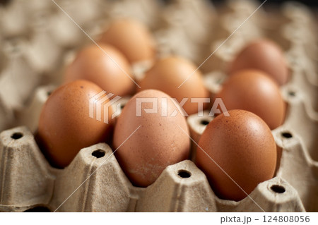 Close up brown eggs in egg box Close up brown eggs in egg box 124808056