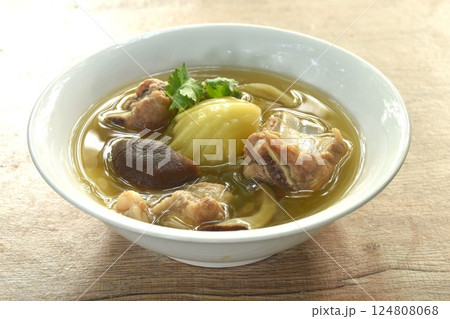 boiled pickled cabbage with pork bone and black mushroom in clear soup on bowl  124808068