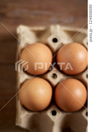 Close up brown eggs in egg box Close up brown eggs in egg box 124808080