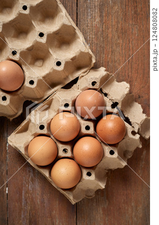Close up brown eggs in egg box Close up brown eggs in egg box 124808082