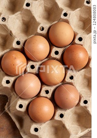 Close up brown eggs in egg box Close up brown eggs in egg box 124808083