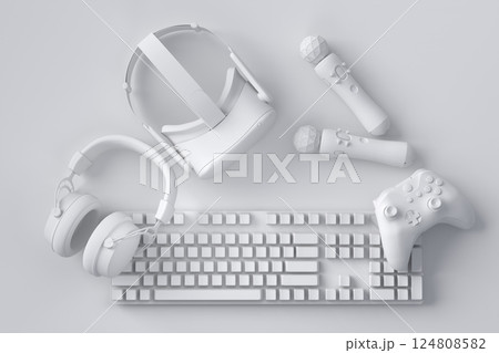 Top view gamer gears like joystick, keyboard, headphones and VR glasses 124808582