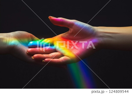 Hands catch a rainbow in sunlight during a...のイラスト素材 [124809544] - PIXTA