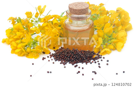 Mustard flowers with oil 124810702
