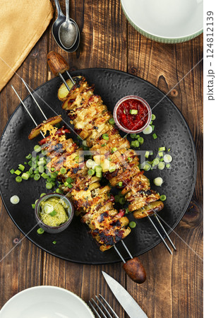 Bacon and fried potatoes, BBQ. 124812139