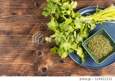 Raw organic fresh cilantro leaves. Raw organic fresh cilantro leaves. 124812152