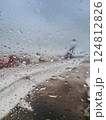Rain drops on Airplane window 124812826
