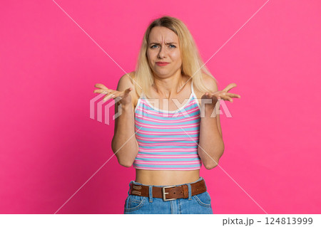 Upset frustrated annoyed woman expressing disbelief irritation negative emotion quarrel stress 124813999