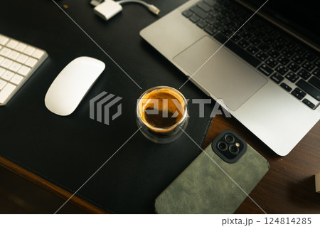 Coffee shot in a glass on the desk Coffee shot in a glass on the desk 124814285