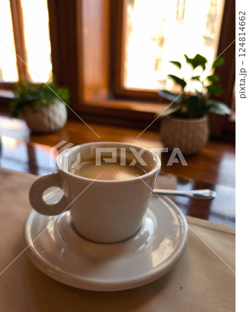 Enjoying a cup of coffee Lungo in a prague cafe in april 124814662