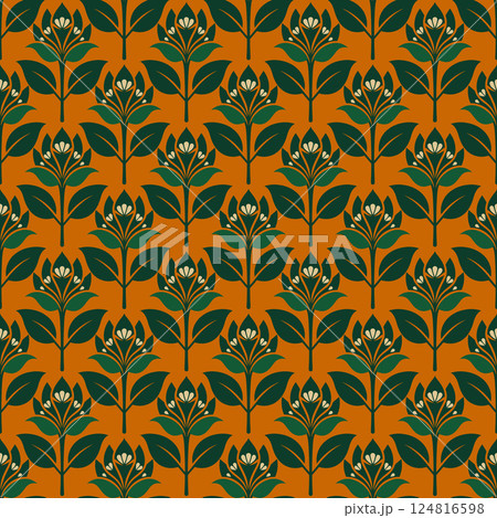 A pattern of green leaves and flowers is displayed on an orange background 124816598