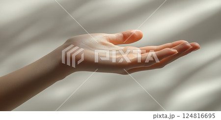 Open hand receiving or giving something on neutral background 124816695