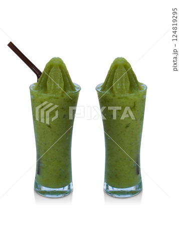 front view two green cold avocado smoothie in a tall, slender glass with a brown tube on white background, fruit, drink, food, copy space front view two green cold avocado smoothie in a tall, slender glass with a brown tube on white background, fruit, drink, food, copy space 124819295