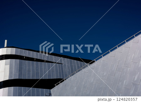 futuristic building with steel wall 124820357