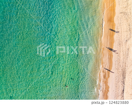 Sea surface aerial view,Bird eye view photo of waves water surface texture,Summer sea background,Beautiful nature Amazing view sea background 124823880