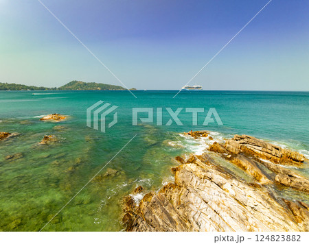 Beautiful seashore nature landscape in phuket Thailand,Amazing landscape waves crashing on rock in summer season background,Wide angle view drone shot Beautiful seashore nature landscape in phuket Thailand,Amazing landscape waves crashing on rock in summer season background,Wide angle view drone shot 124823882