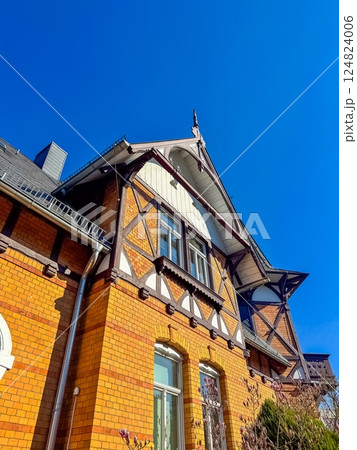 Brick Villa Architecture, Blue Sky, Ornate Details, Historic Building. High quality photo Brick Villa Architecture, Blue Sky, Ornate Details, Historic Building. High quality photo 124824006