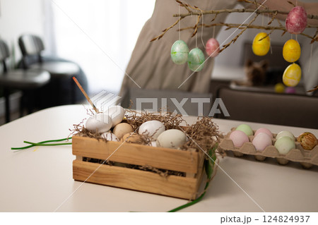 Beautiful and Colorful Easter Decorations Featuring Festive Eggs and Twigs for a Joyful Atmosphere Beautiful and Colorful Easter Decorations Featuring Festive Eggs and Twigs for a Joyful Atmosphere 124824937