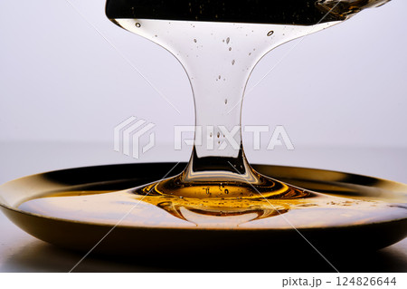 Photo of a sugar paste for depilation hair removal procedure. Texture. Photo of a sugar paste for depilation hair removal procedure. Texture. 124826644