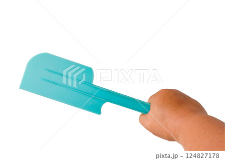 Blue plastic spatula for baking on white background Blue plastic spatula for baking on white background 124827178
