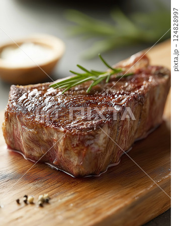 Juicy grilled steak with herbs, a delicious gourmet meal for a perfect dinner. Juicy grilled steak with herbs, a delicious gourmet meal for a perfect dinner. 124828997