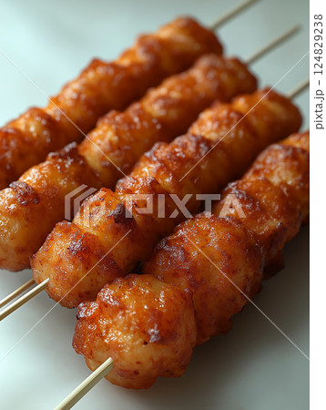 Delicious grilled kebab skewers of roasted chicken, a tasty and savory barbecue dish 124829238