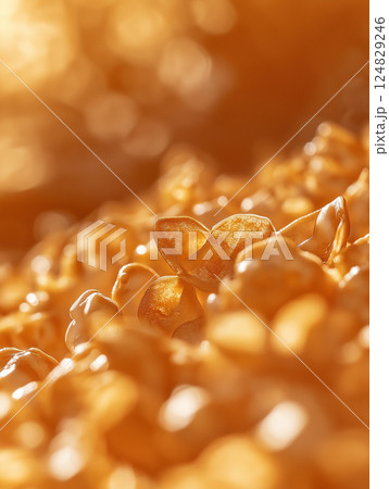 Close-up of crunchy buttery popcorn golden and delicious for snacktime cravings at cinema Close-up of crunchy buttery popcorn golden and delicious for snacktime cravings at cinema 124829246
