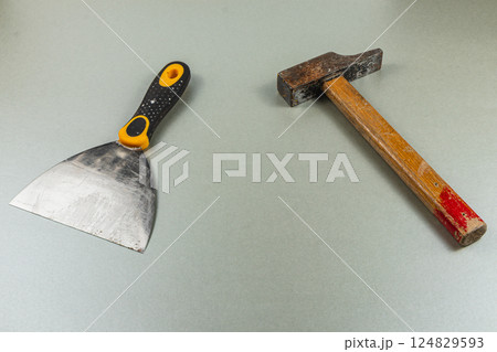 Tools for home renovation project on a gray surface Tools for home renovation project on a gray surface 124829593