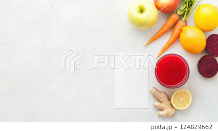 Flatlay with raw ABC juice ingredients and glass of juice on white textured surface, combining clean composition and functional nutrition inspiration. Flatlay with raw ABC juice ingredients and glass of juice on white textured surface, combining clean composition and functional nutrition inspiration. 124829662