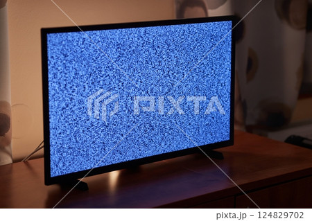 TV in a dim living room 124829702