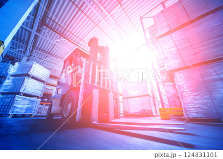Forklift loader in storage warehouse ship yard. Distribution products. 124831101