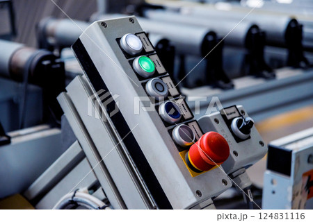 Production line of the wooden floor factory. CNC automatic woodworking machine. Production line of the wooden floor factory. CNC automatic woodworking machine. 124831116