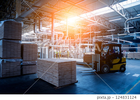 Forklift loader in storage warehouse ship yard. Distribution products.  124831124