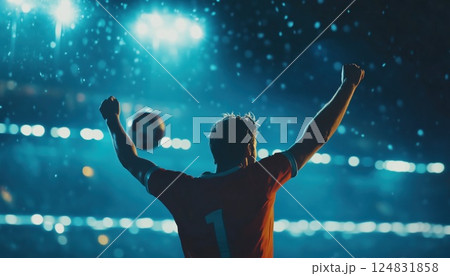 Cinematic Shot Of Professional Football Player Celebrating Goal At Model Sport Stadium Arena. Captured Victory In Sport Championship Tournament. Cinematic Shot Of Professional Football Player Celebrating Goal At Model Sport Stadium Arena. Captured Victory In Sport Championship Tournament. 124831858