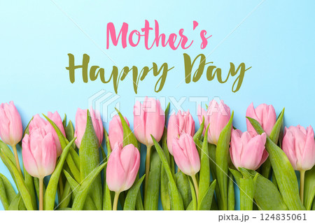 Happy Mother's Day, Bright pink tulips on a blue backdrop convey a cheerful Mother's Day message 124835061