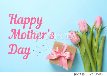 Happy Mother's Day, Bright blue backdrop showcases pink tulips and a gift box, celebrating Mother's Day Happy Mother's Day, Bright blue backdrop showcases pink tulips and a gift box, celebrating Mother's Day 124835080