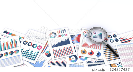 ビジネス資料と虫メガネ、ビジネス業績の検証やデータ分析のイメージ 124837427