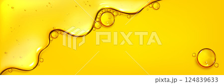 Flowing yellow oil liquid texture with bubbles 124839633
