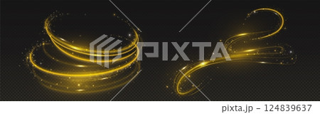 Golden magic light trails on black background. 124839637