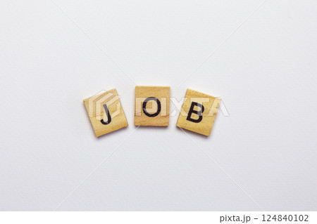 The inscription job made from wooden small cubes on a white background. Search robots, advertising, banner. 124840102