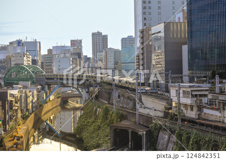 Red Train Passing by Canal in Urban City Neighborhood, Ochanomizu Dec 8 2024 Red Train Passing by Canal in Urban City Neighborhood, Ochanomizu Dec 8 2024 124842351