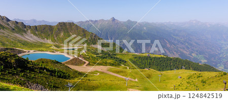 Scenic alpine landscape Kals Grossglockner valley with blue artificial lake Tyrol mountains nature background. Panoramic view Alps summer hiking trail adventure tourism recreational area 124842519