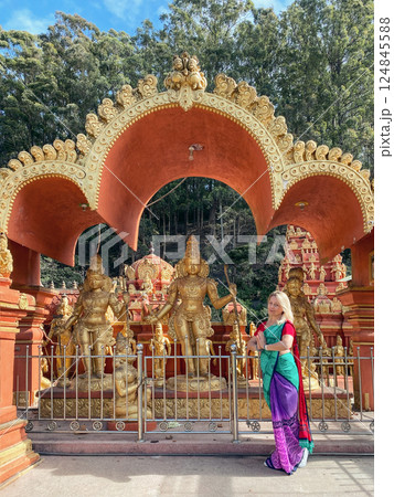 Woman dressed in sari near Seetha Amman Temple in Nuwara Eliya 124845588