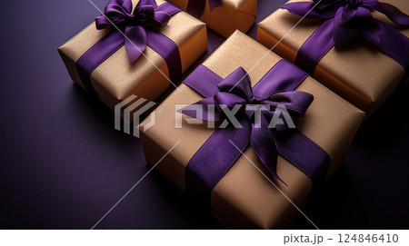 Closeup craft pink gift box purple holiday background, copy space, banner Merry Christmas, New Year 124846410