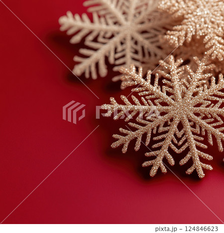 Merry Christmas, Happy New Year. Red background golden white Christmas snowflakes close up 124846623