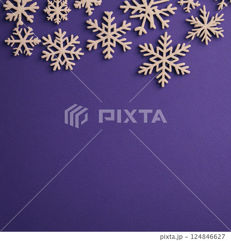 Merry Christmas, Happy New Year. Purple violet background golden white Christmas snowflakes close up 124846627