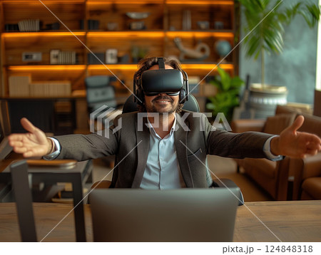 Business portrait rich corporate Caucasian man business suit outstretched arms sitting desk office wearing VR headset glasses. Reality using technology work. Concept using modern technology 124848318