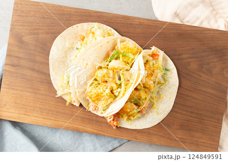 Shrimp Tacos with Shrimp, Vegetables, and Spices Wrapped in Tortillas 124849591