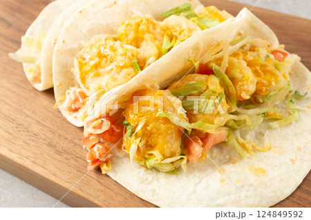 Shrimp Tacos with Shrimp, Vegetables, and Spices Wrapped in Tortillas 124849592